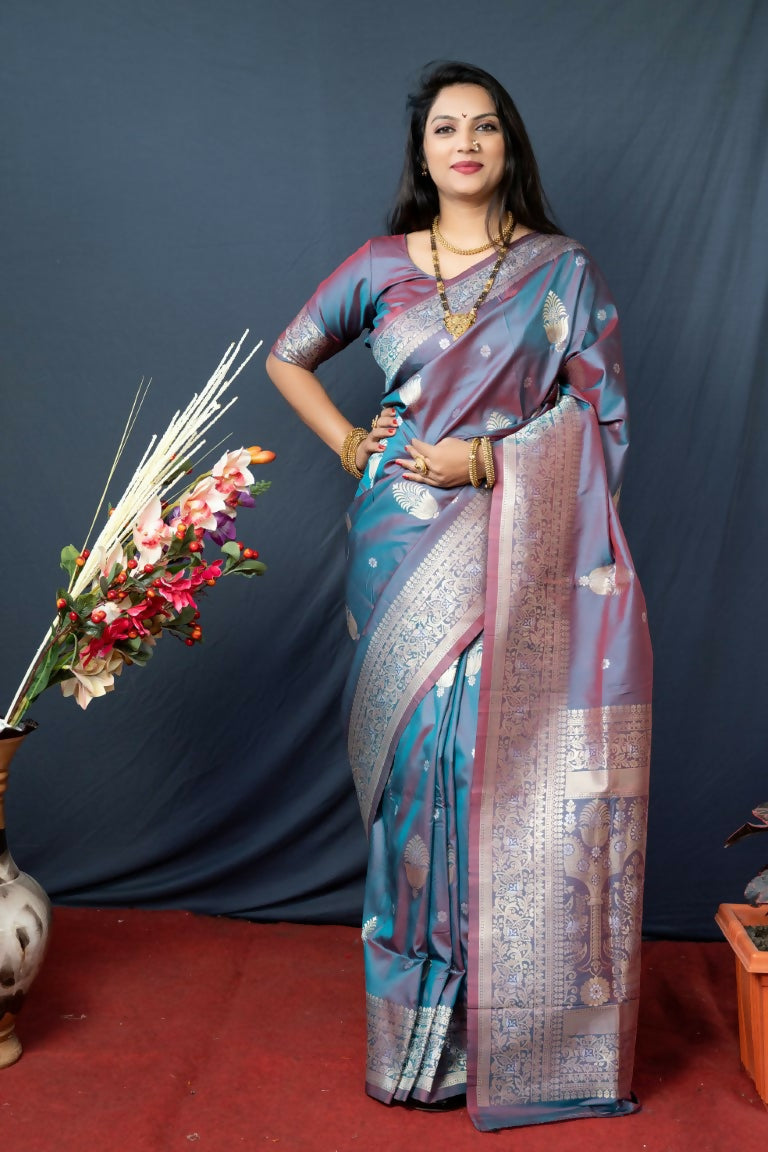 Elegant grey Paithani silk saree with intricate zari woven patterns and matching blouse.