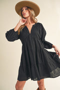 Trendy summer mini dress with balloon sleeves and tiered skirt detail