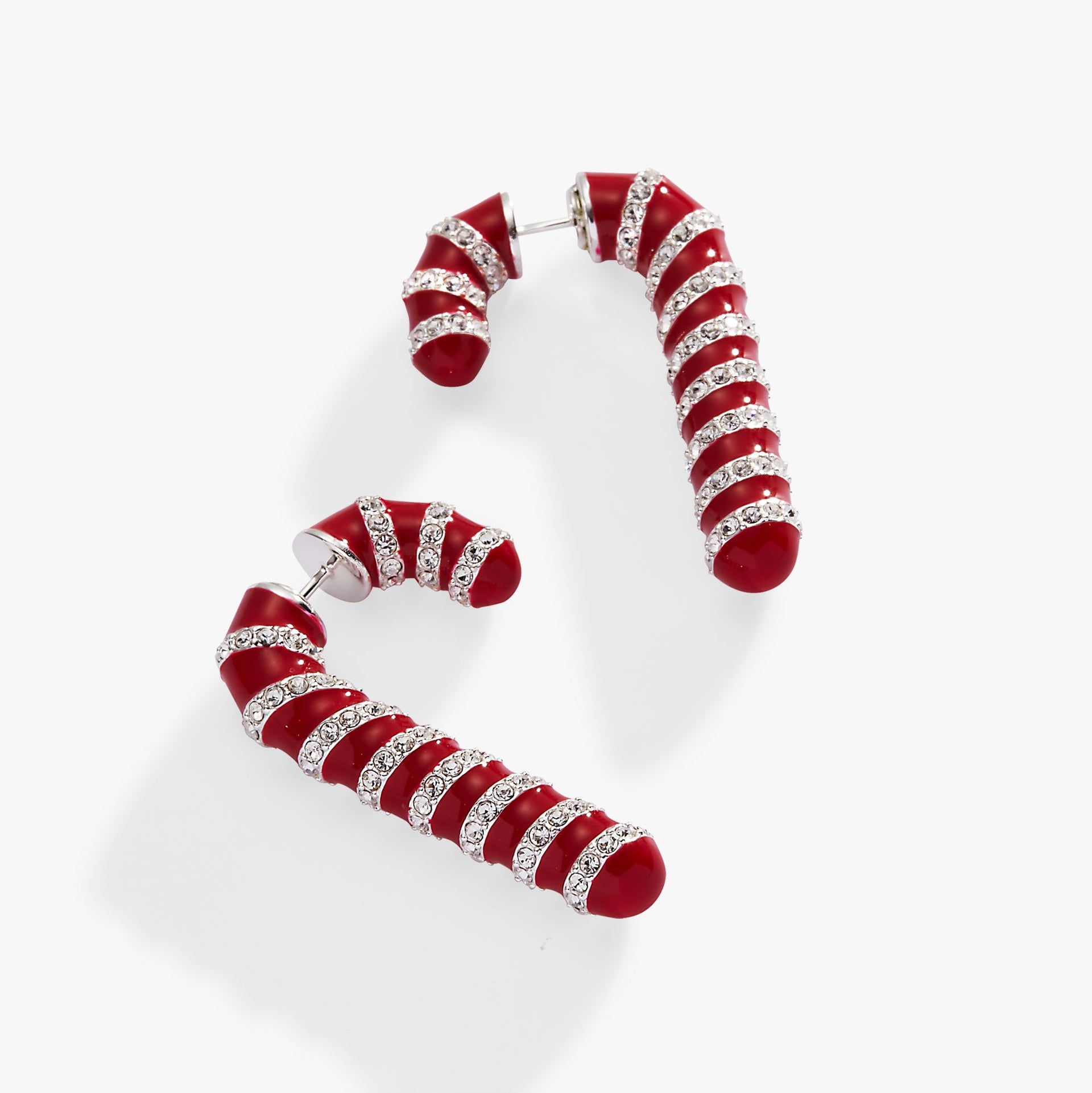 Festive candy cane front-back earrings with red enamel stripes and pave crystals on a polished silver setting.