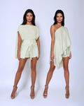 Model wearing a lightweight, breathable linen-viscose blend cape top in a versatile, elegant silhouette.