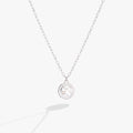 Double-sided silver Capricorn zodiac pendant necklace with crystal accents.