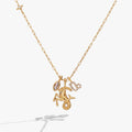 Elegant gold-plated Capricorn zodiac charm cluster necklace with crystal pavé details.