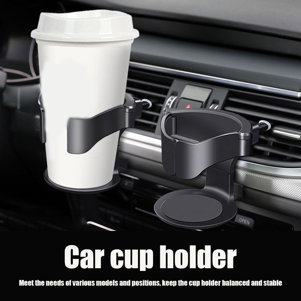 Minimalist matte black adjustable car air vent cup holder mounted in a vehicle interior