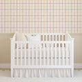 Close up of Carson pastel plaid wallpaper in yellow, pink, green, and lavender for nursery decor