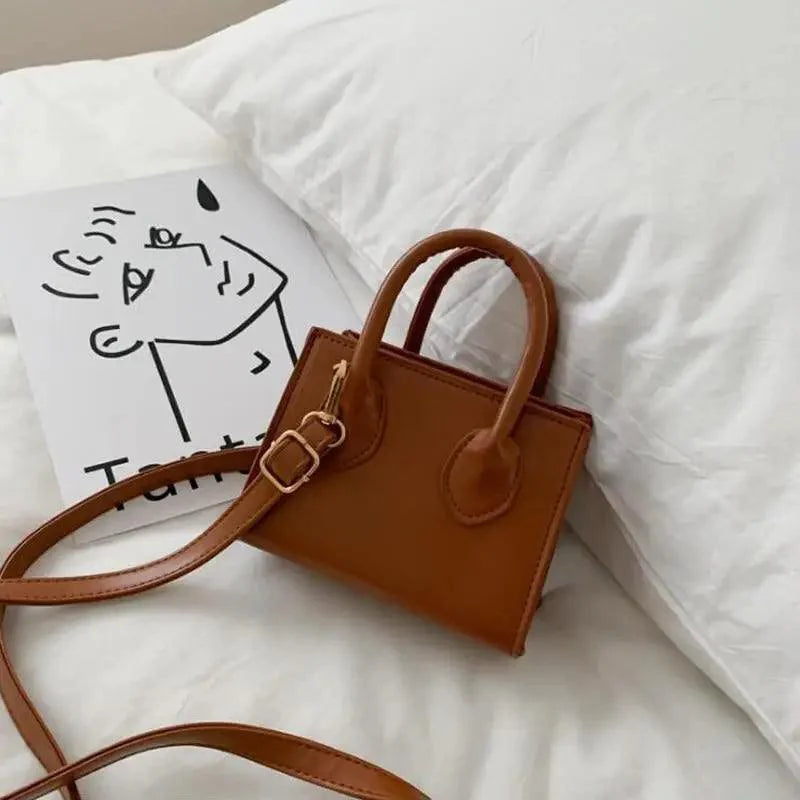 Small casual flap shoulder bag for women in a minimalist design