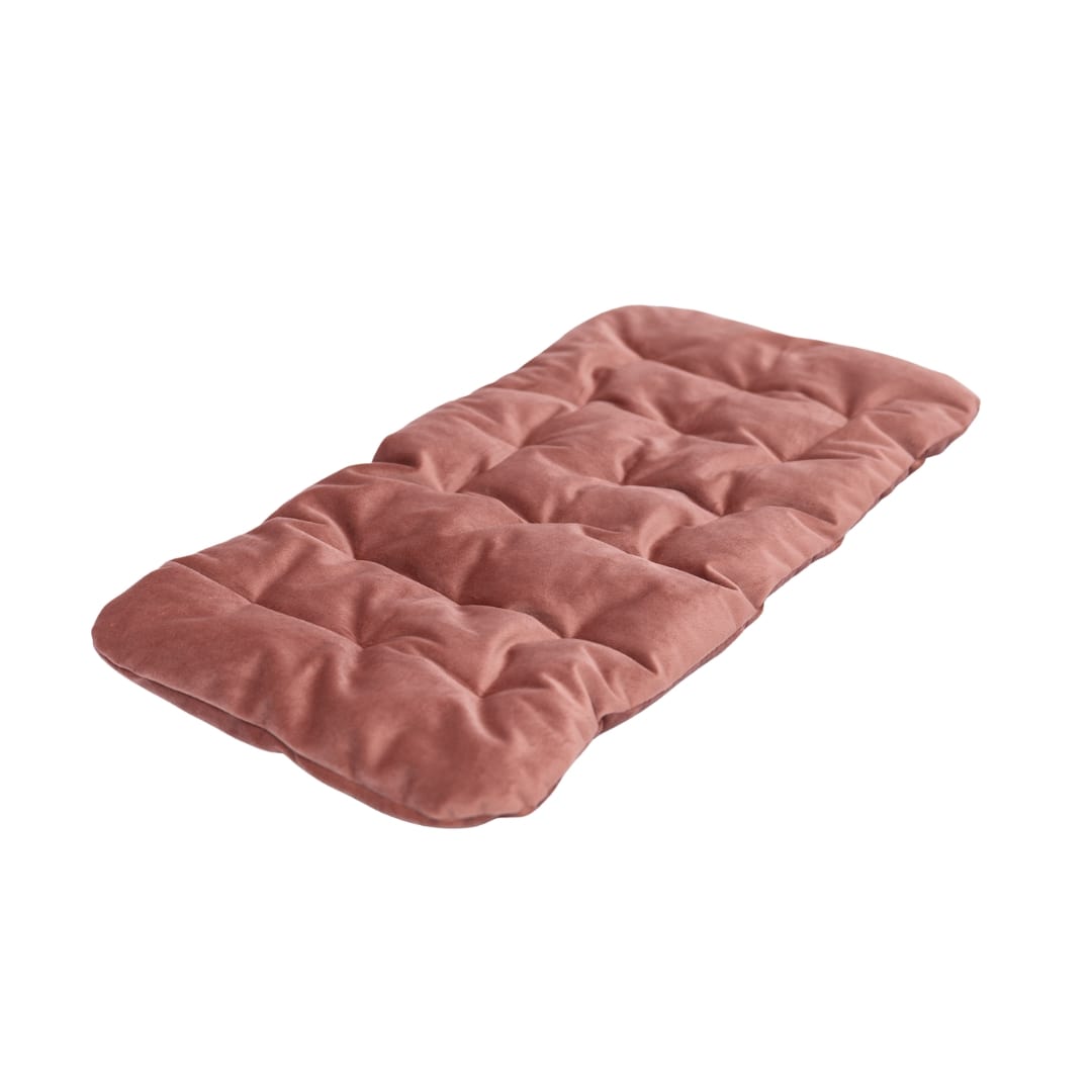A soft, plush pink sleeping pillow for cats by Enjoy The Wood