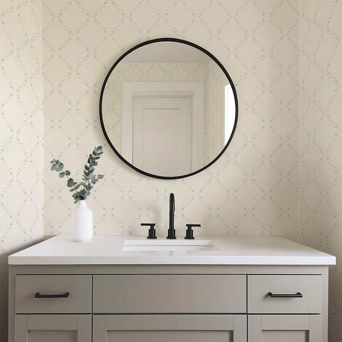 Close up of the Leela geometric wallpaper featuring beige and brown tones.