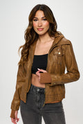 Women wearing a brown vegan leather hooded double-zip jacket in an urban setting