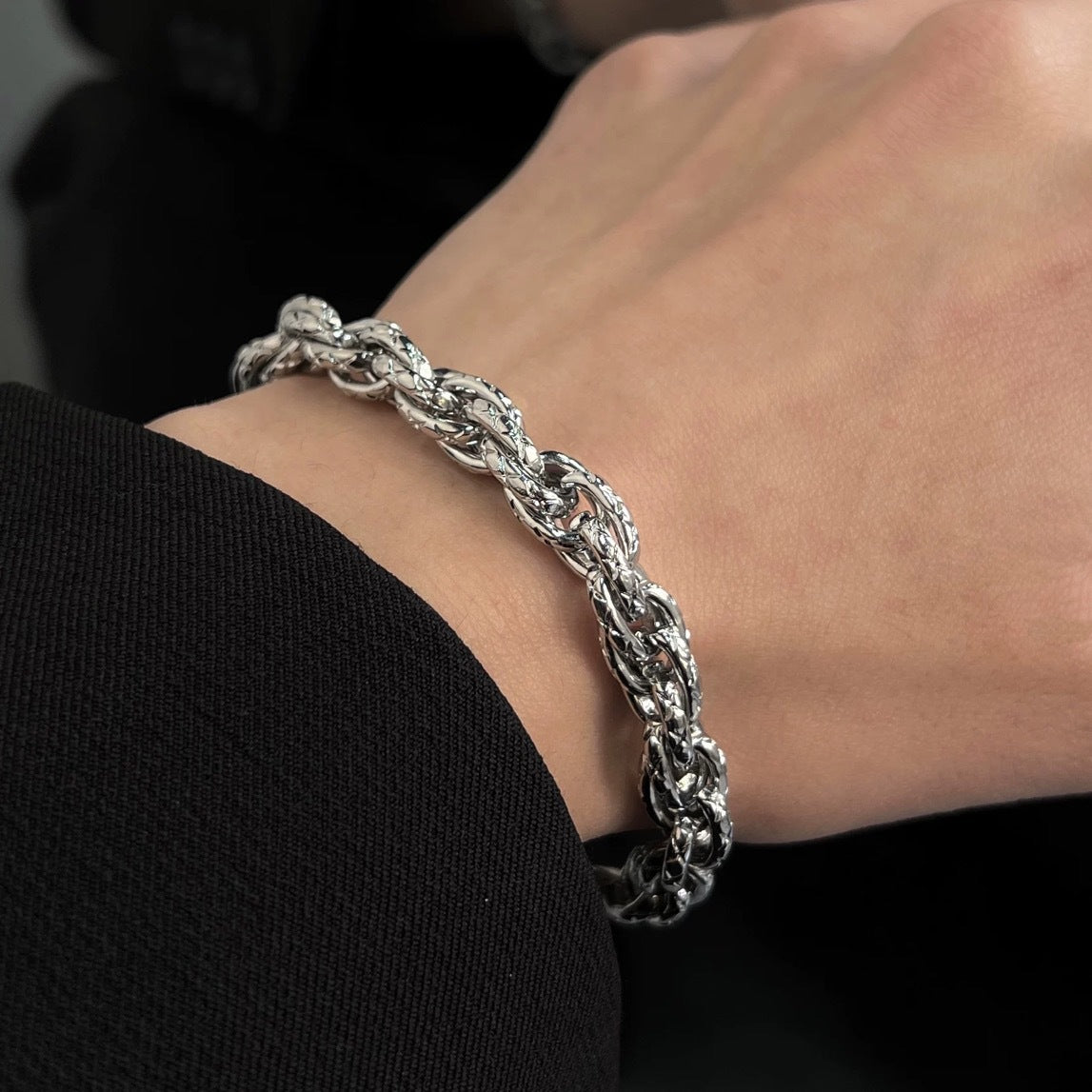 Silver titanium steel braided twist bracelet for men and women in a minimalist hip-hop style