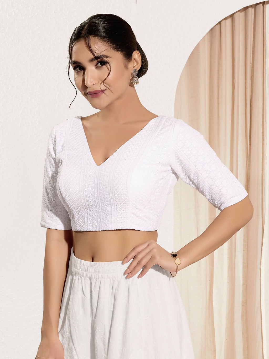 White shifli embroidered padded blouse with V-neck and elbow sleeves