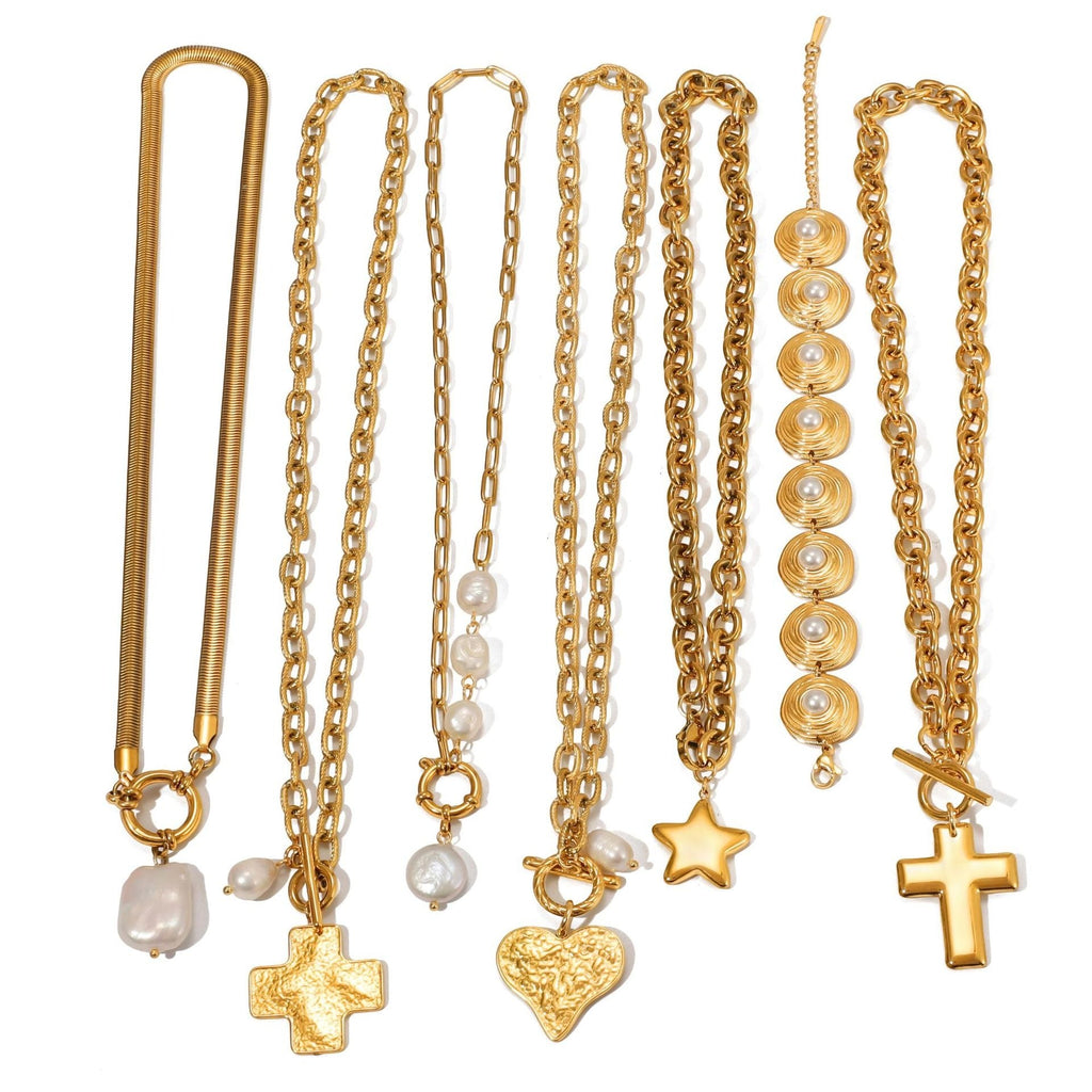 Elegant 18K gold and pearl sweater necklace styled for a luxury winter look.