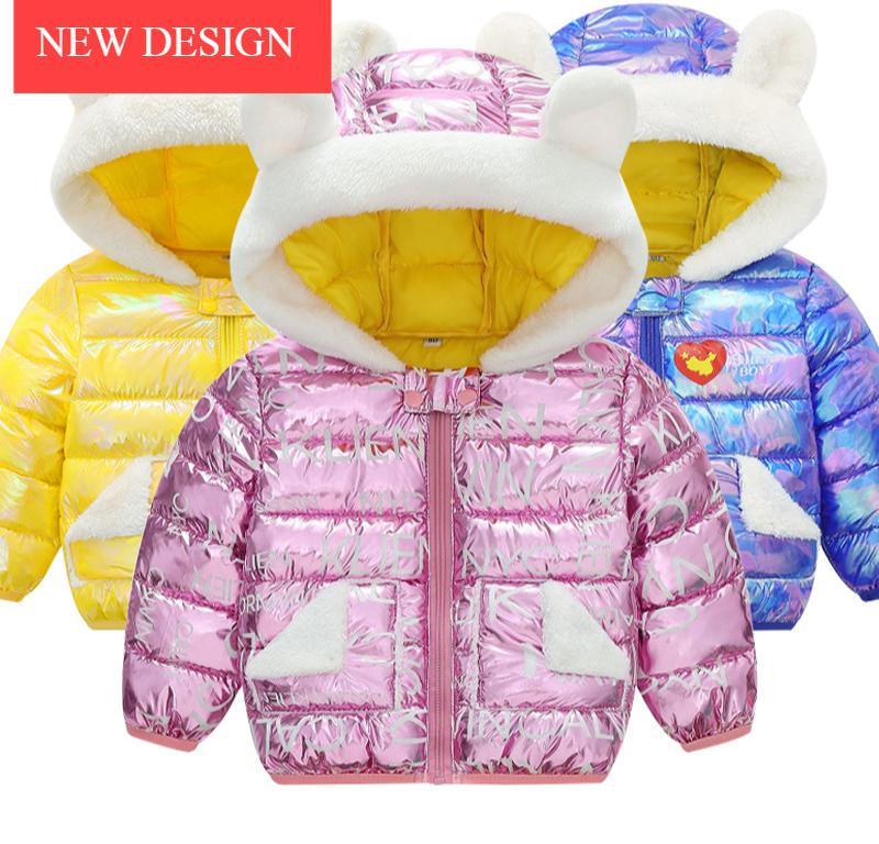 Baby wearing a shiny iridescent hooded winter jacket with contrast white lining