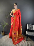 A vibrant red Lichi silk Paithani saree with white polka dot patterns and a matching blouse fabric.