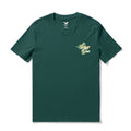 Dark green t-shirt with a pelican in paradise graphic reading More Surf Less Work