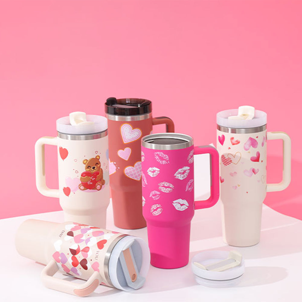 40 oz stainless steel insulated tumbler with handle and straw in a tapered, spill-proof design