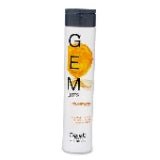Celeb Luxury Gem Lites Tourmaline Colorwash Shampoo bottle in white and orange.
