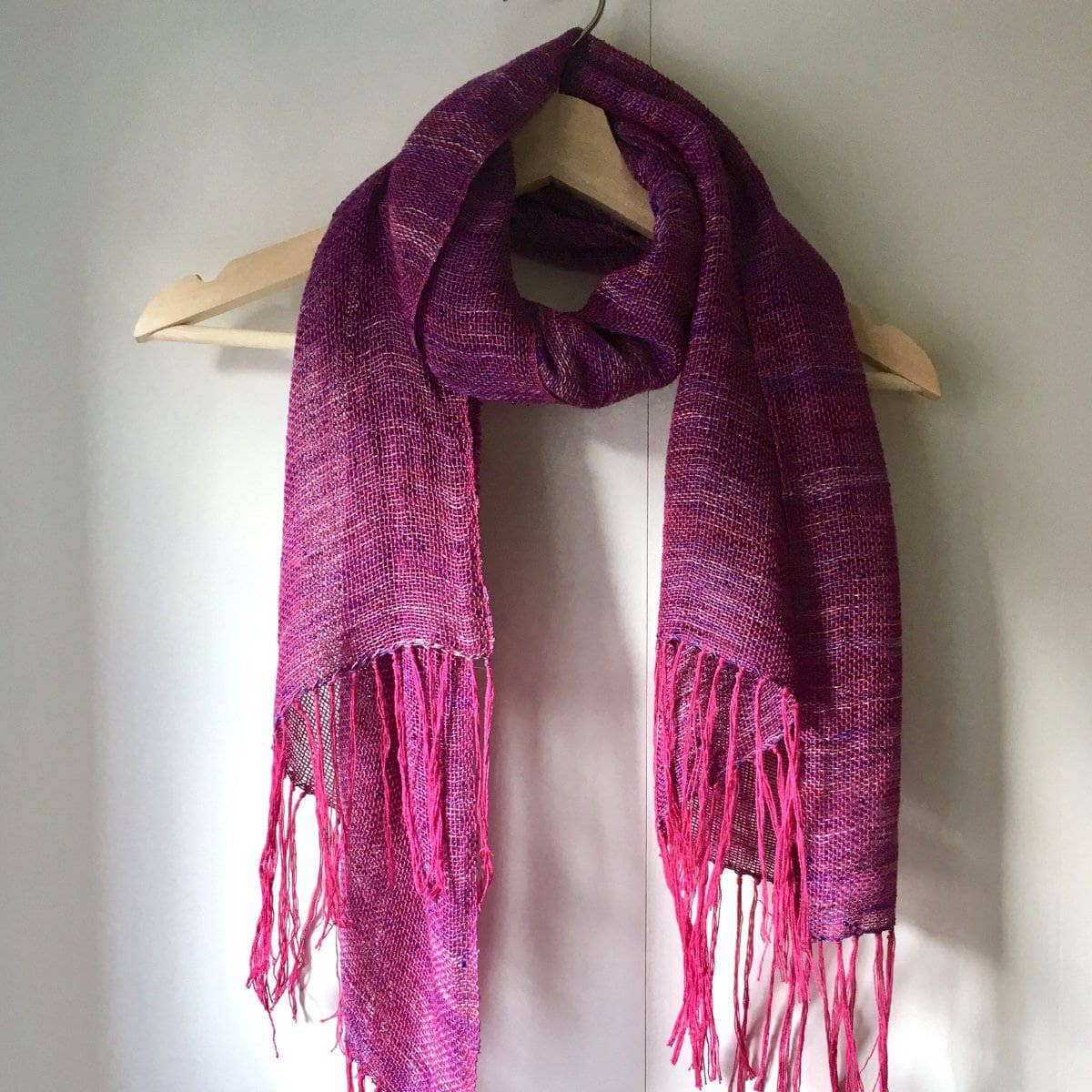 Close up of Celestial Silk Beaded Shawl Weaving Kit with two types of lace weight silk yarn