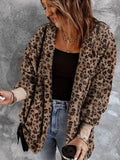 Women wearing a trendy fuzzy leopard print hooded jacket