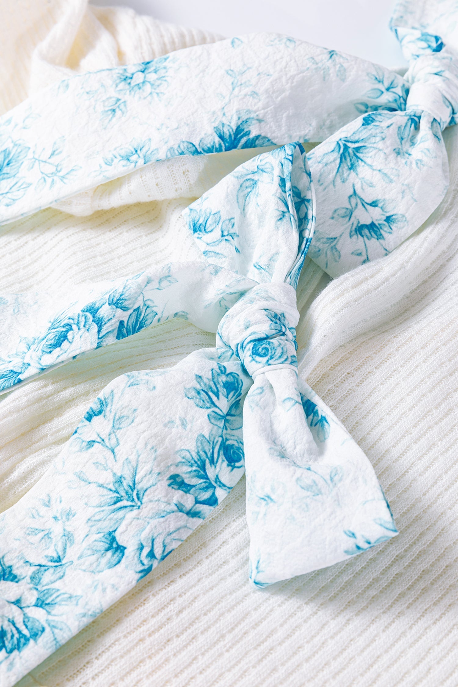 Textured Knit V-Neck Peplum Top with Feminine Bubble Sleeves