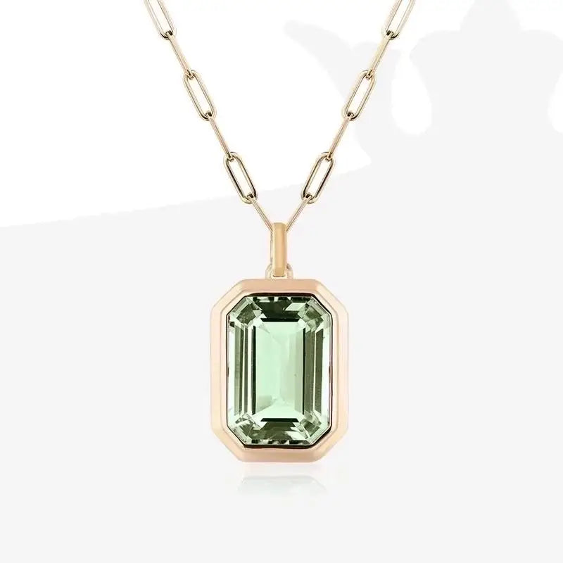 Molly Zircon Pendant Necklace in green featuring a square stone with 18k gold plated finish.