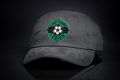 A relaxed-fit dad hat featuring a soccer ball graphic, perfect for soccer fans.