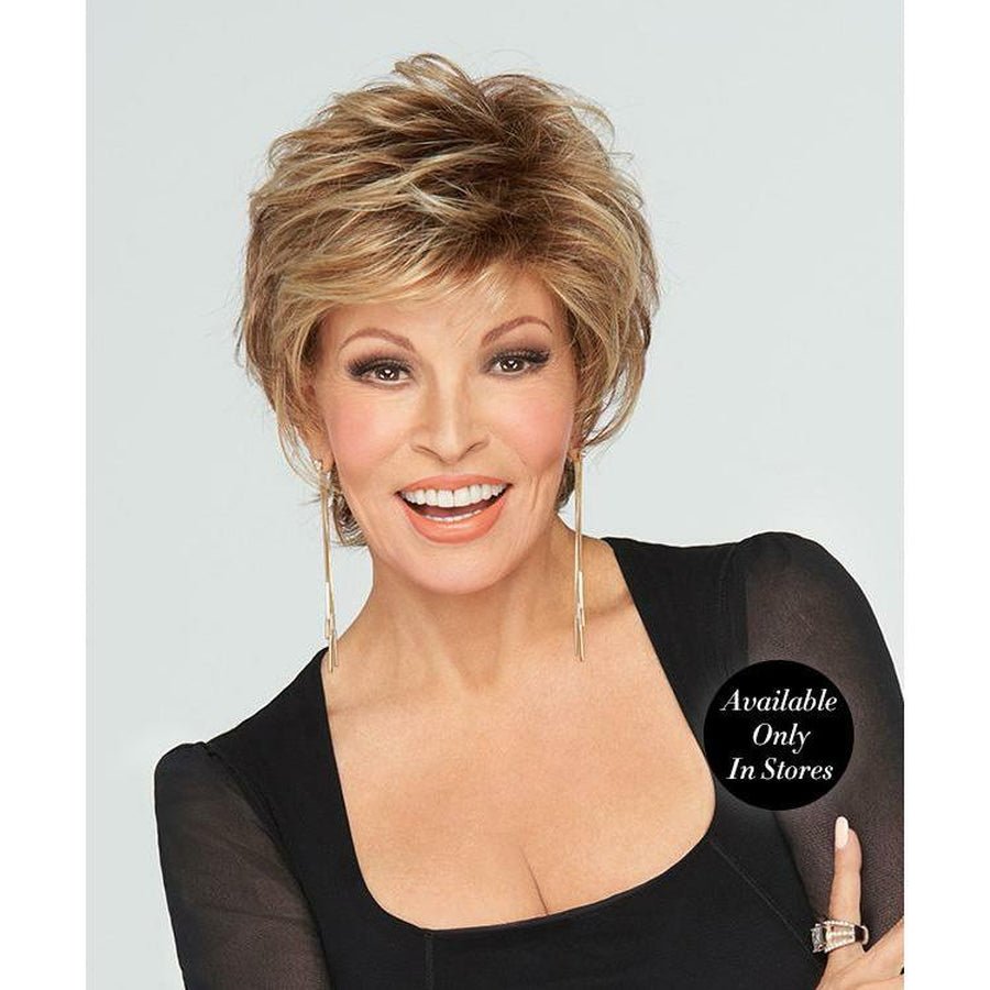 Woman wearing the Chick It Up short layered wig in a multi-tonal blonde style