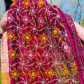 Close up of a Chiffon Phulkari scarf featuring intricate traditional embroidery and lightweight fabric texture.