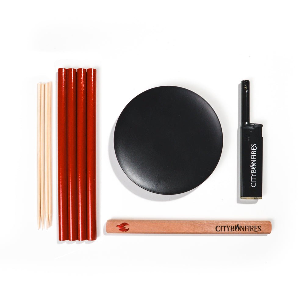 Sleek black metal trivet and patio accessory kit for outdoor fire pits