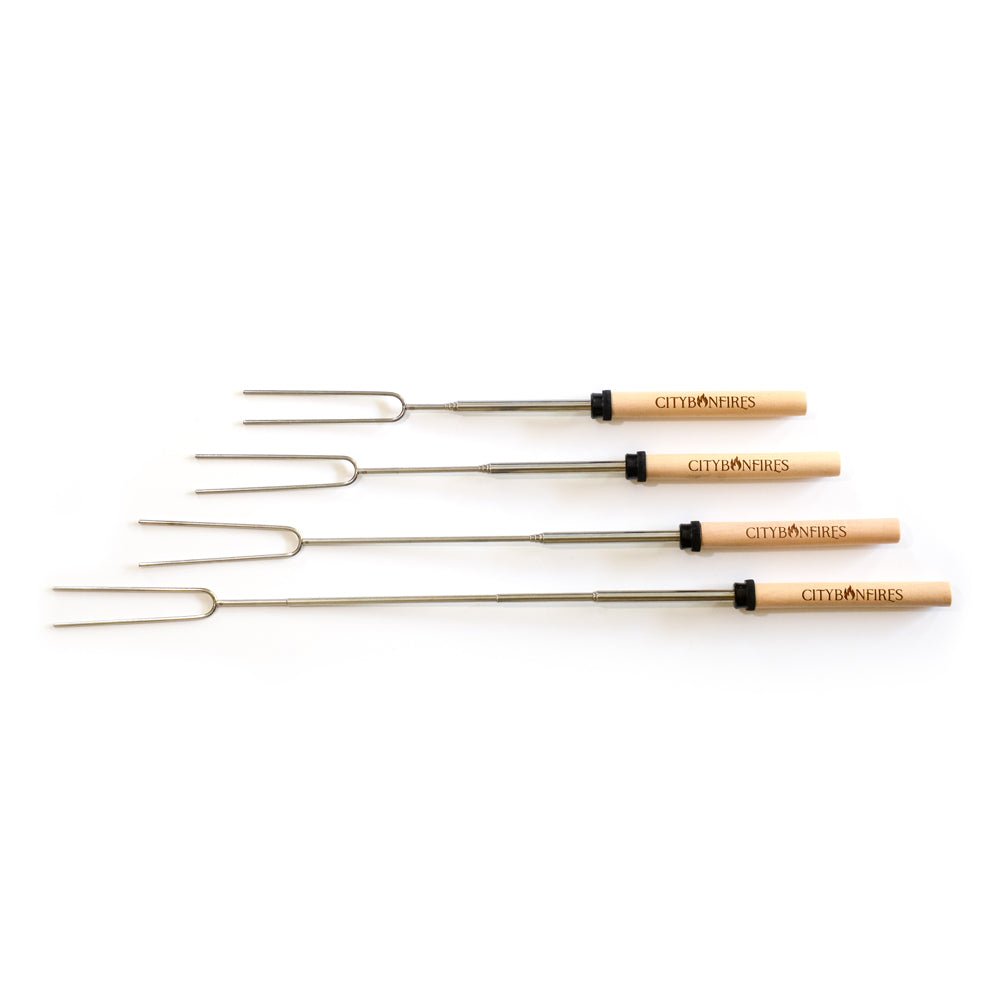 Set of four telescoping metal s'mores roasting sticks with wooden handles and a storage bag for outdoor fire pits.