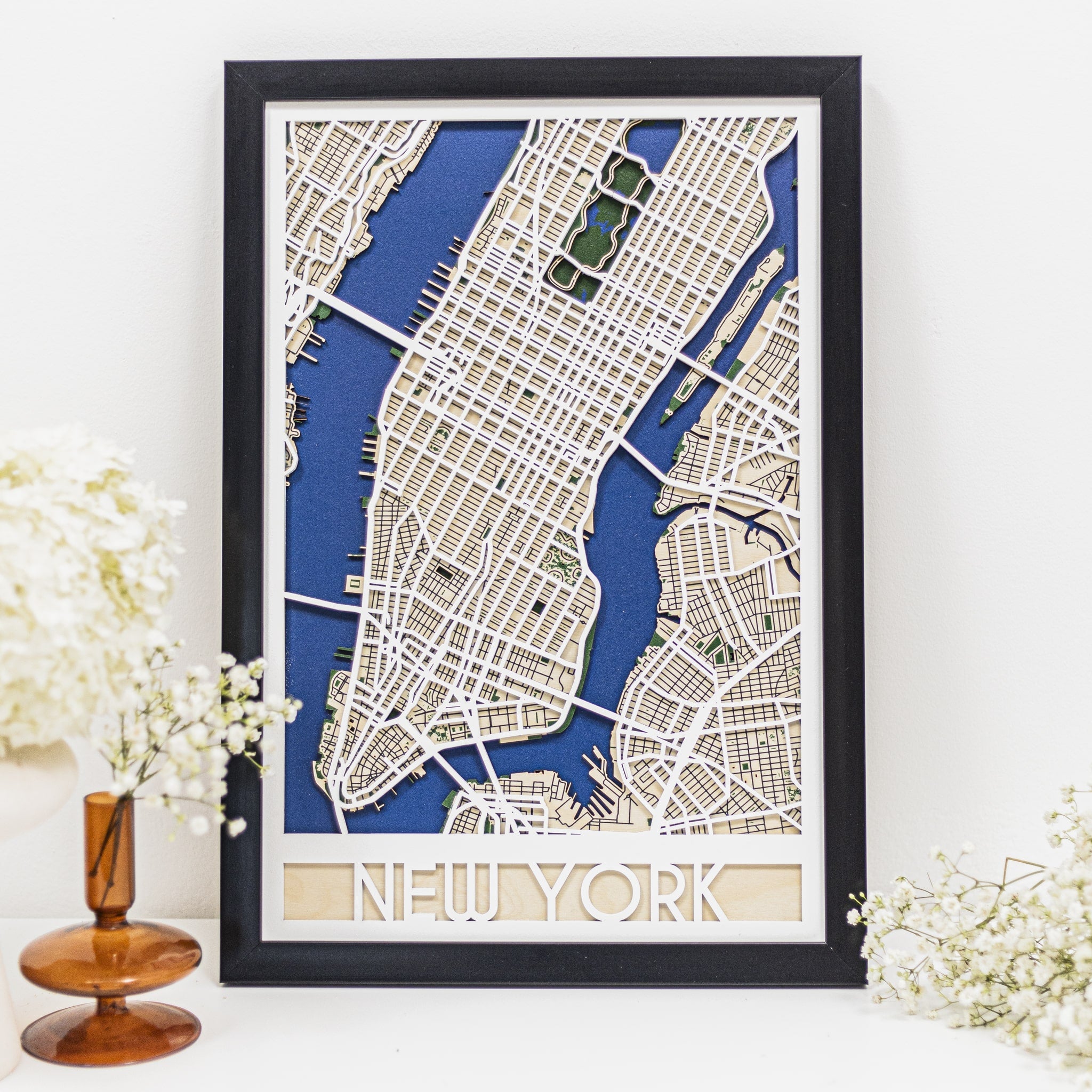 Handcrafted 3D wooden wall art of New York City map showing Manhattan grid and rivers