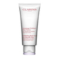 Clarins Exfoliating Body Scrub in a white and red tube, 6.9 OZ.