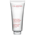 Clarins Moisture-Rich Body Lotion with shea butter in white and red packaging.
