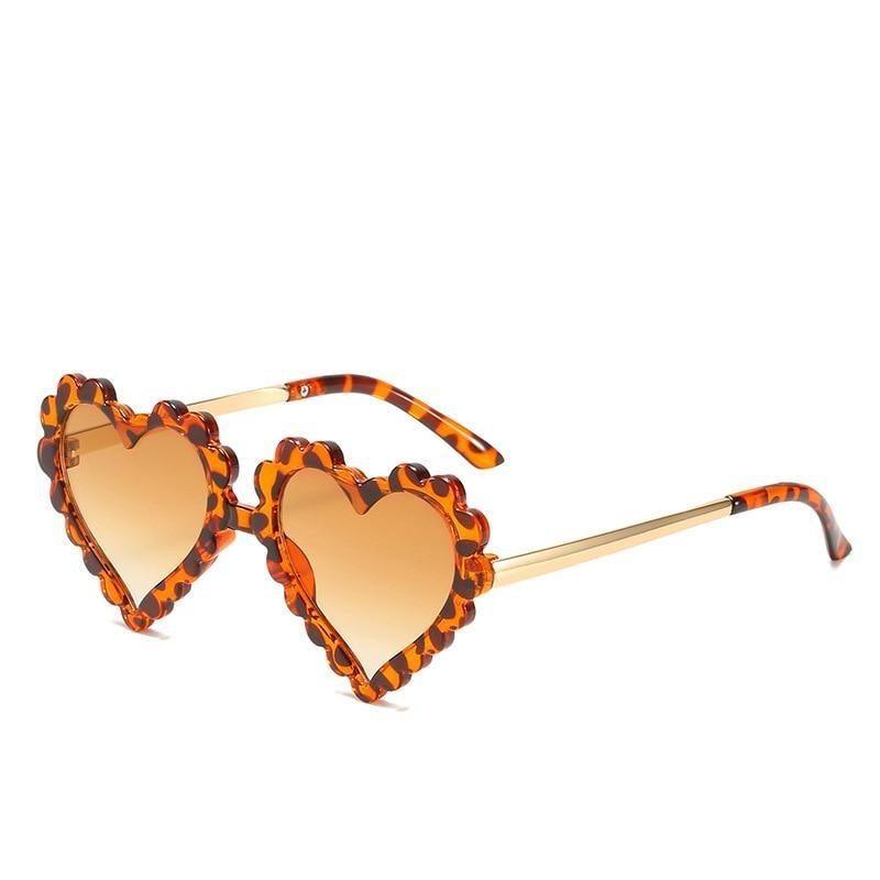 Cute pink heart-shaped glitter sunglasses for children