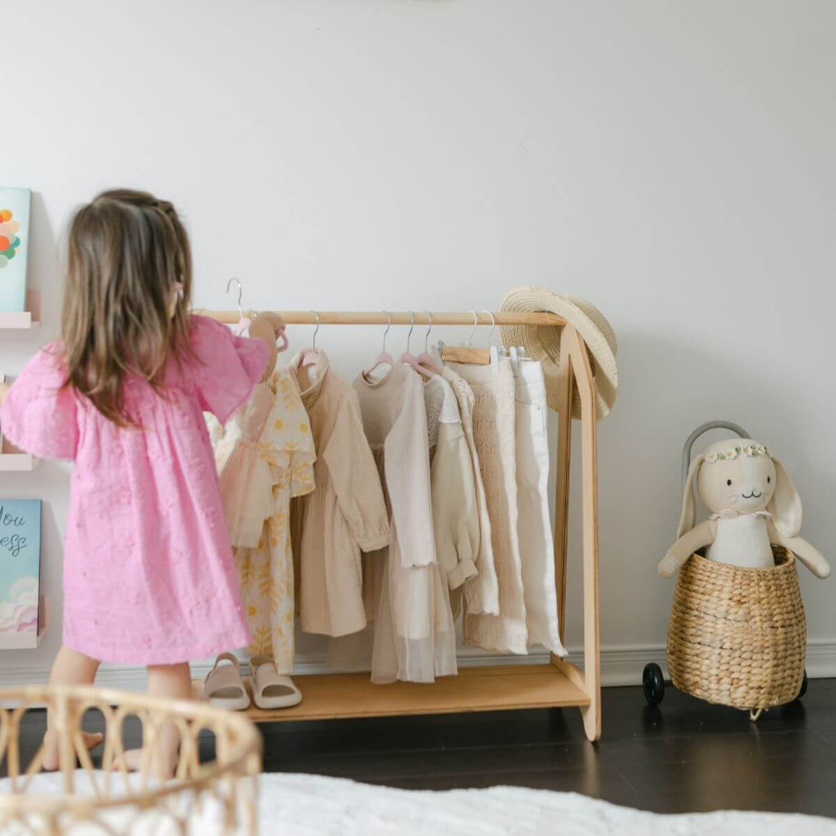 Montessori-style birch plywood clothes rack for toddler nursery organization