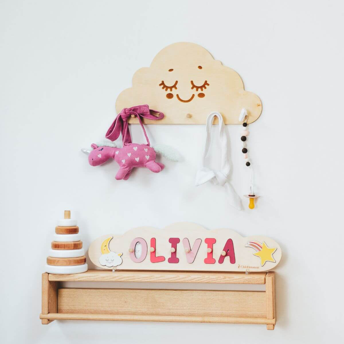 Decorative cloud-shaped wall hanger for nursery organization in light-wood and white