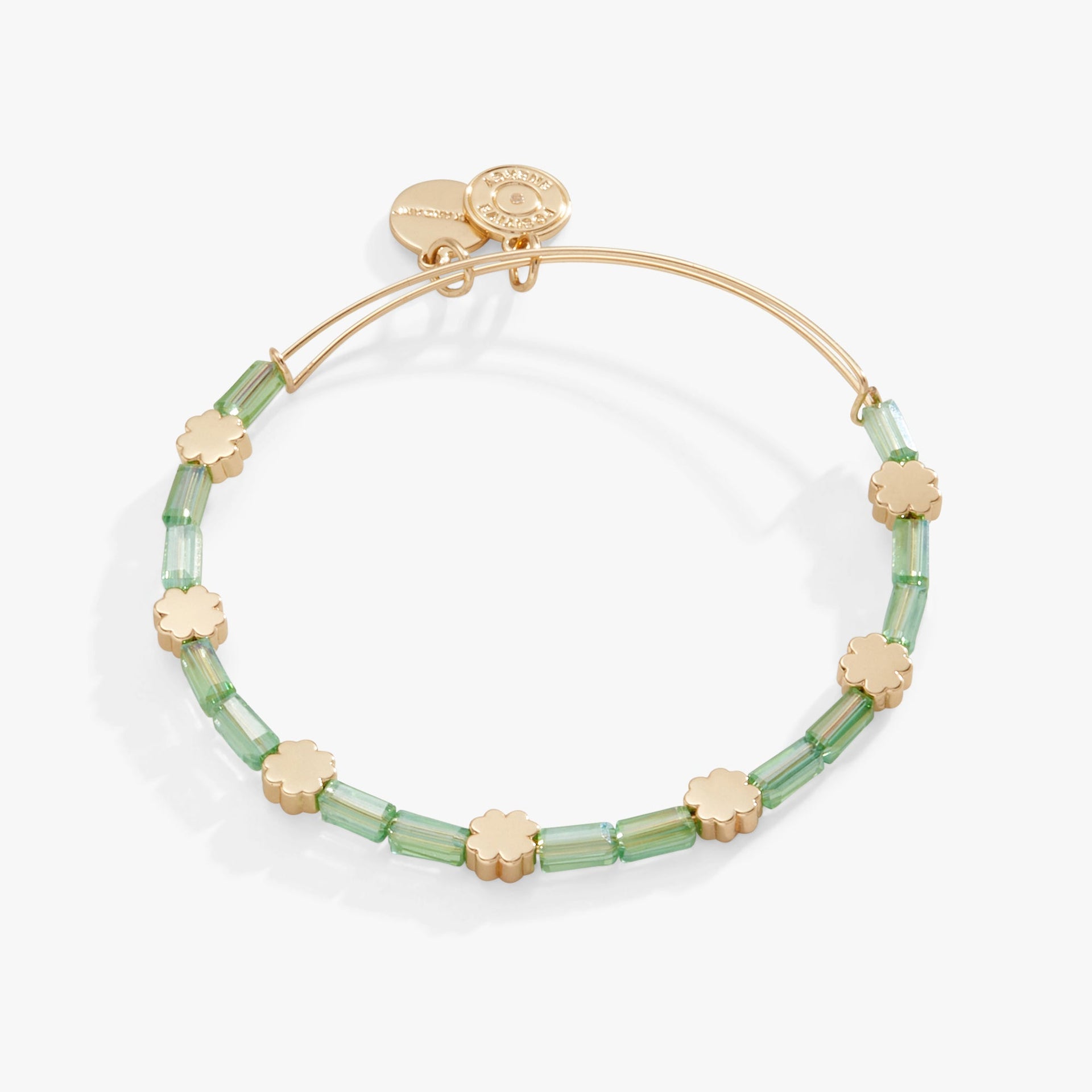 Gold beaded bangle featuring a green four-leaf clover charm and crystal accents