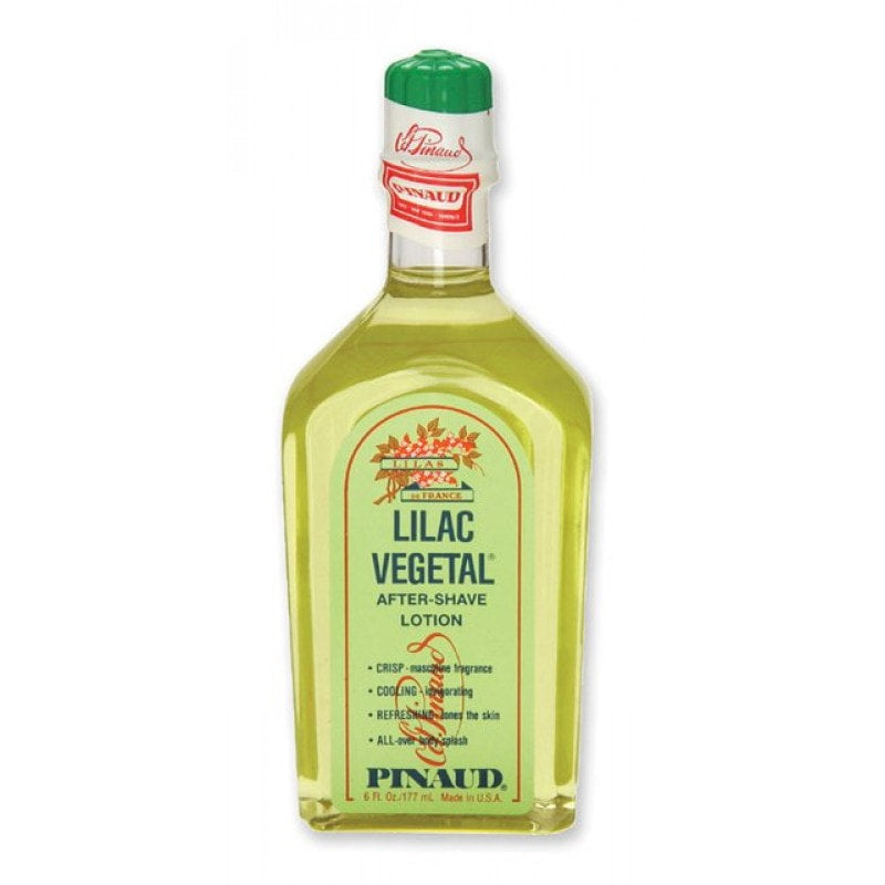 Bottle of Clubman Lilac Vegetal After Shave Lotion featuring a vintage floral design