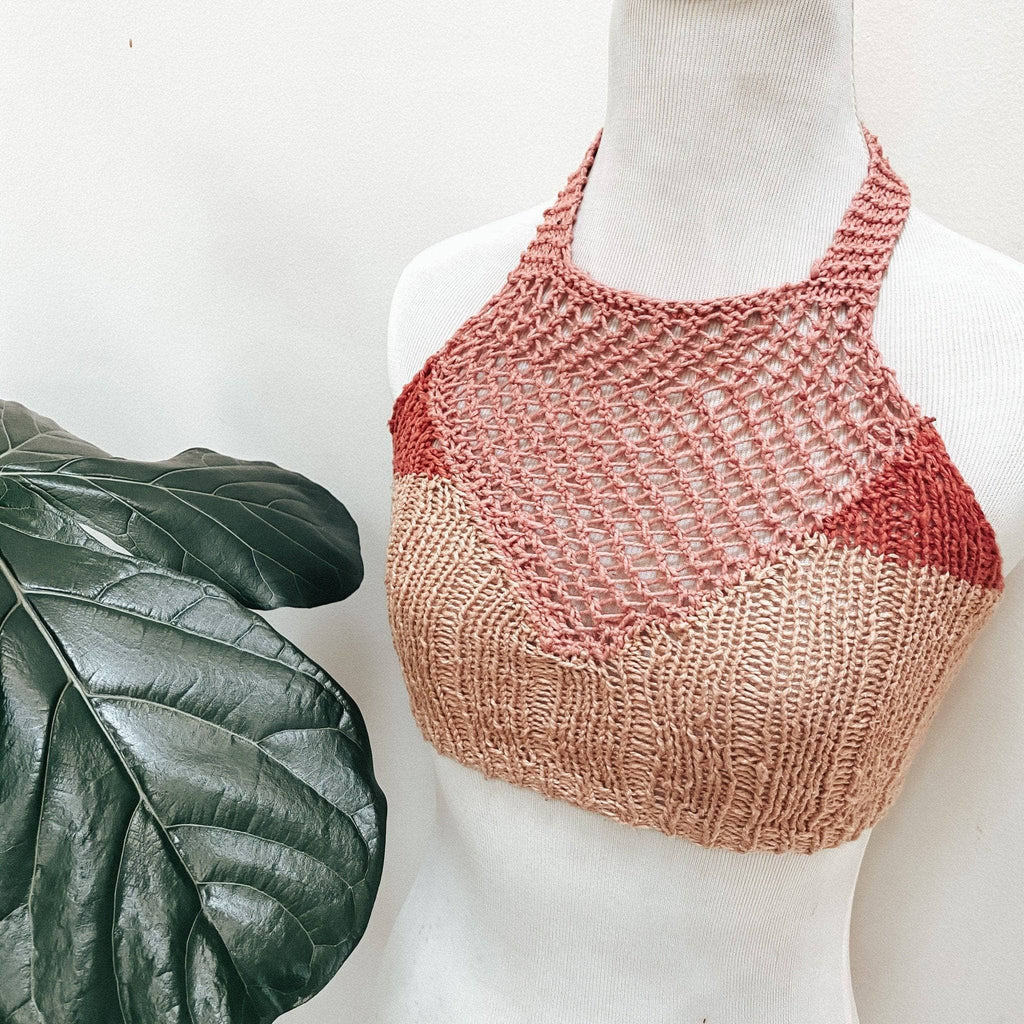 Close up of the Coconut Tree Knit Bralette pattern in a terracotta color, featuring a halter neckline and tie closure.