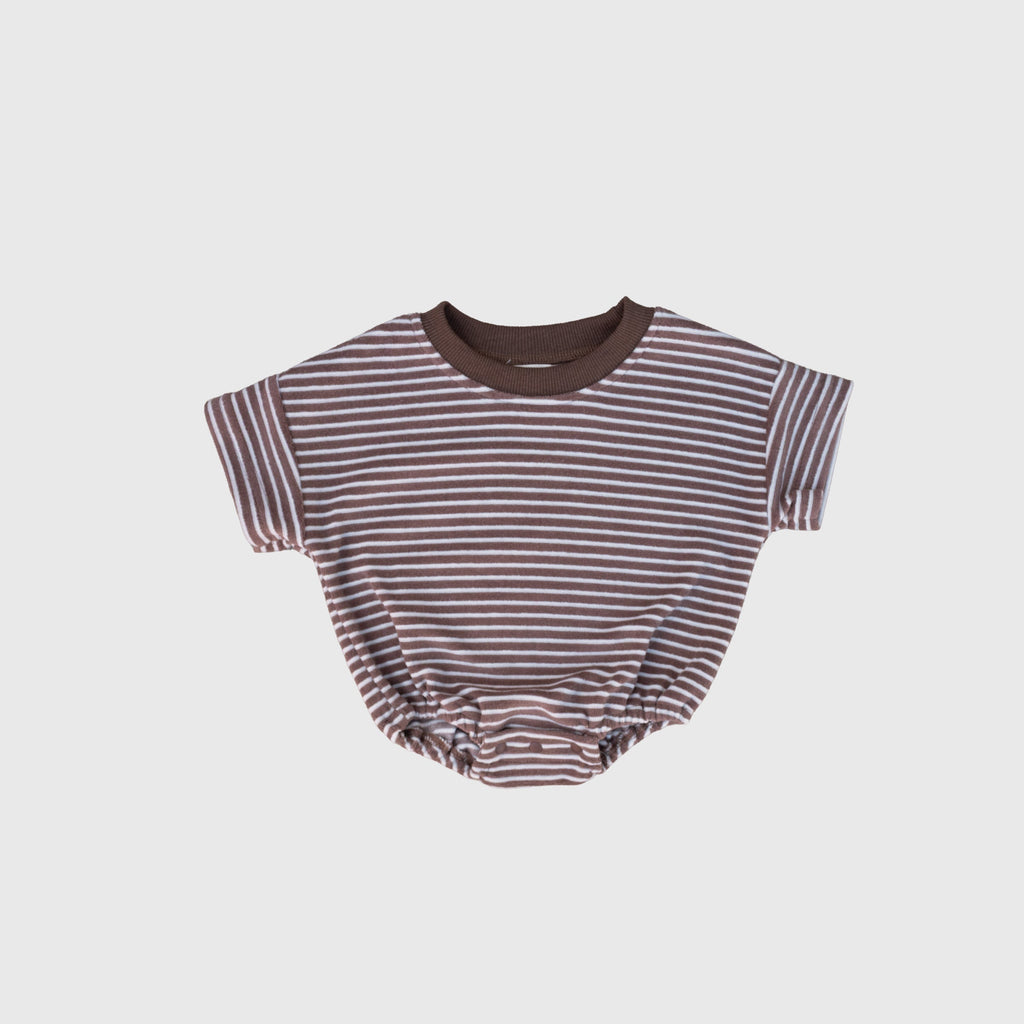 Baby wearing a minimalist cola and white striped short-sleeve terry romper with crew neckline