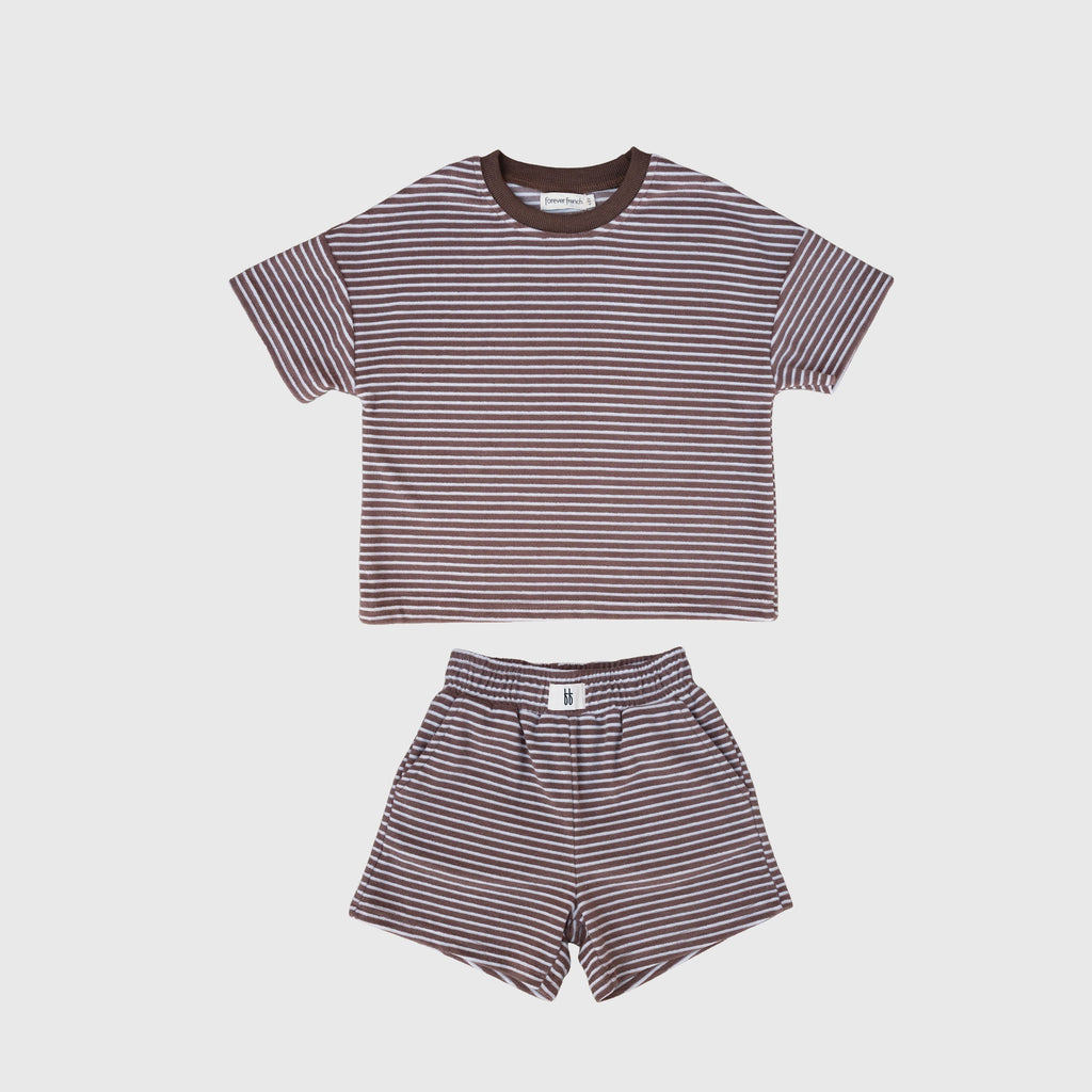 Child wearing a soft cola brown and white striped terry short set, perfect for active play