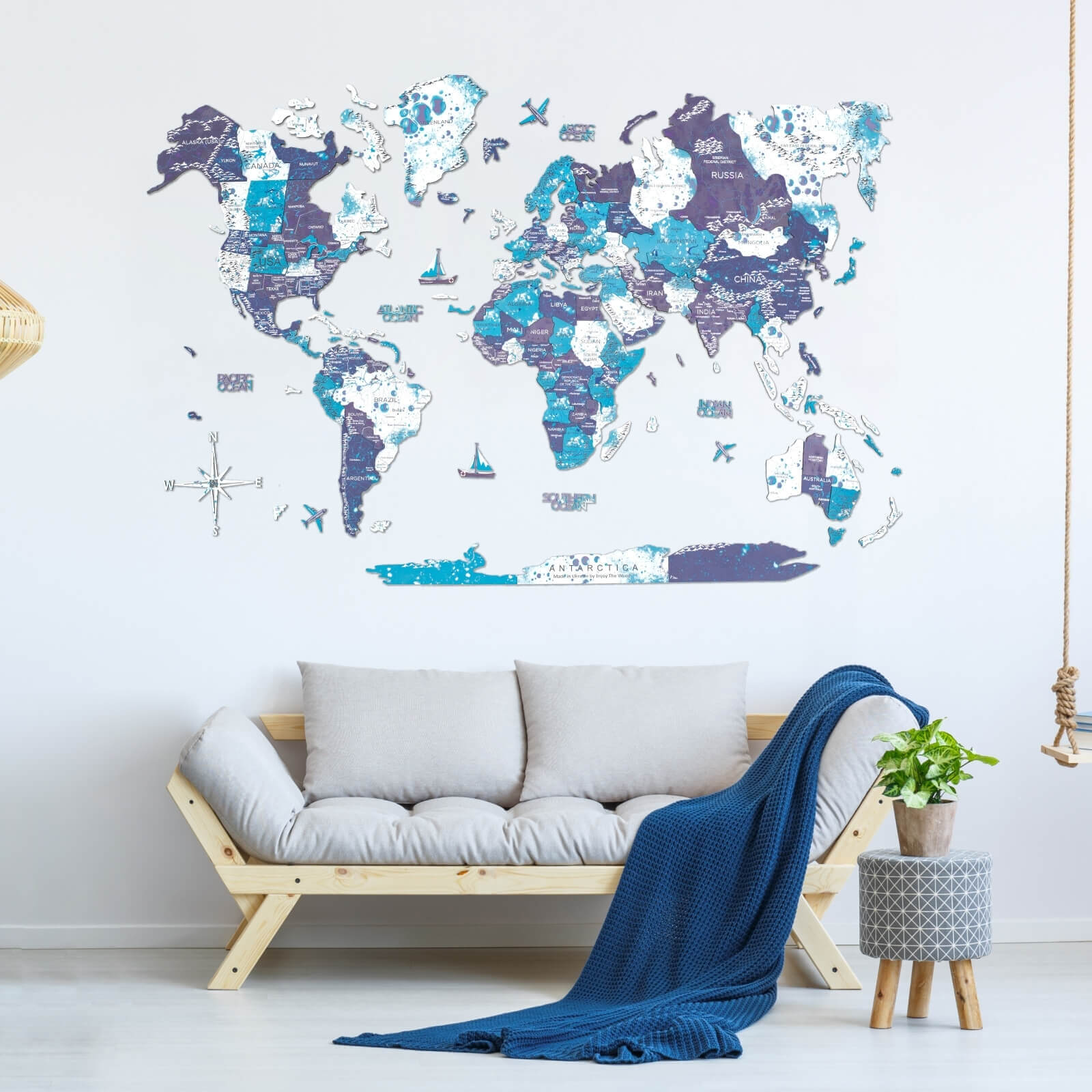 3D Wooden World Map in Ocean blue color palette mounted on a wall