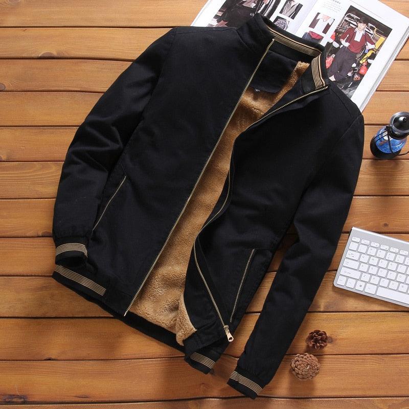 Men wearing a stylish slim-fit cotton windbreaker jacket with ribbed cuffs and hem.