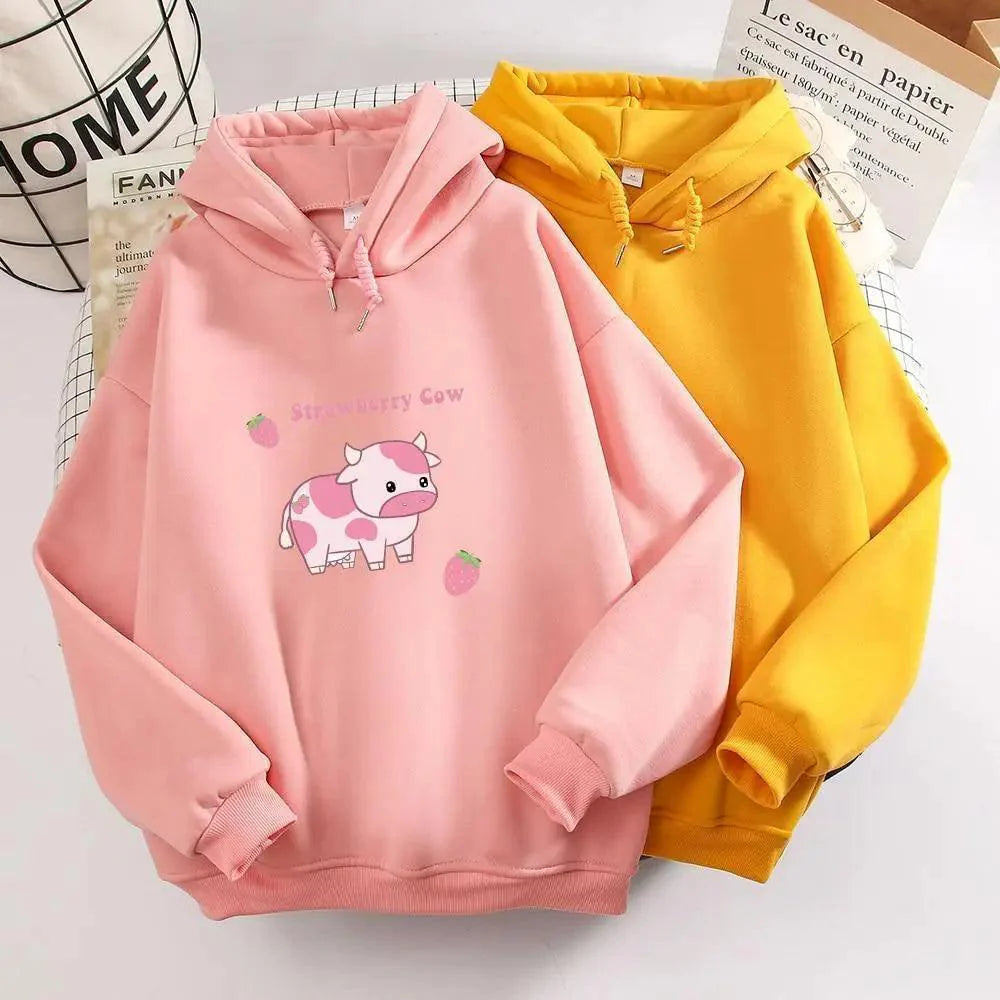 Oversized hoodie featuring a cute strawberry and cow print pattern.