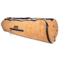 Natural cork yoga mat carrier bag featuring a J-zipper and exterior storage pockets