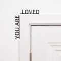 Wooden corner wall decor with the text You Are Loved, perfect for a nursery or kids room.