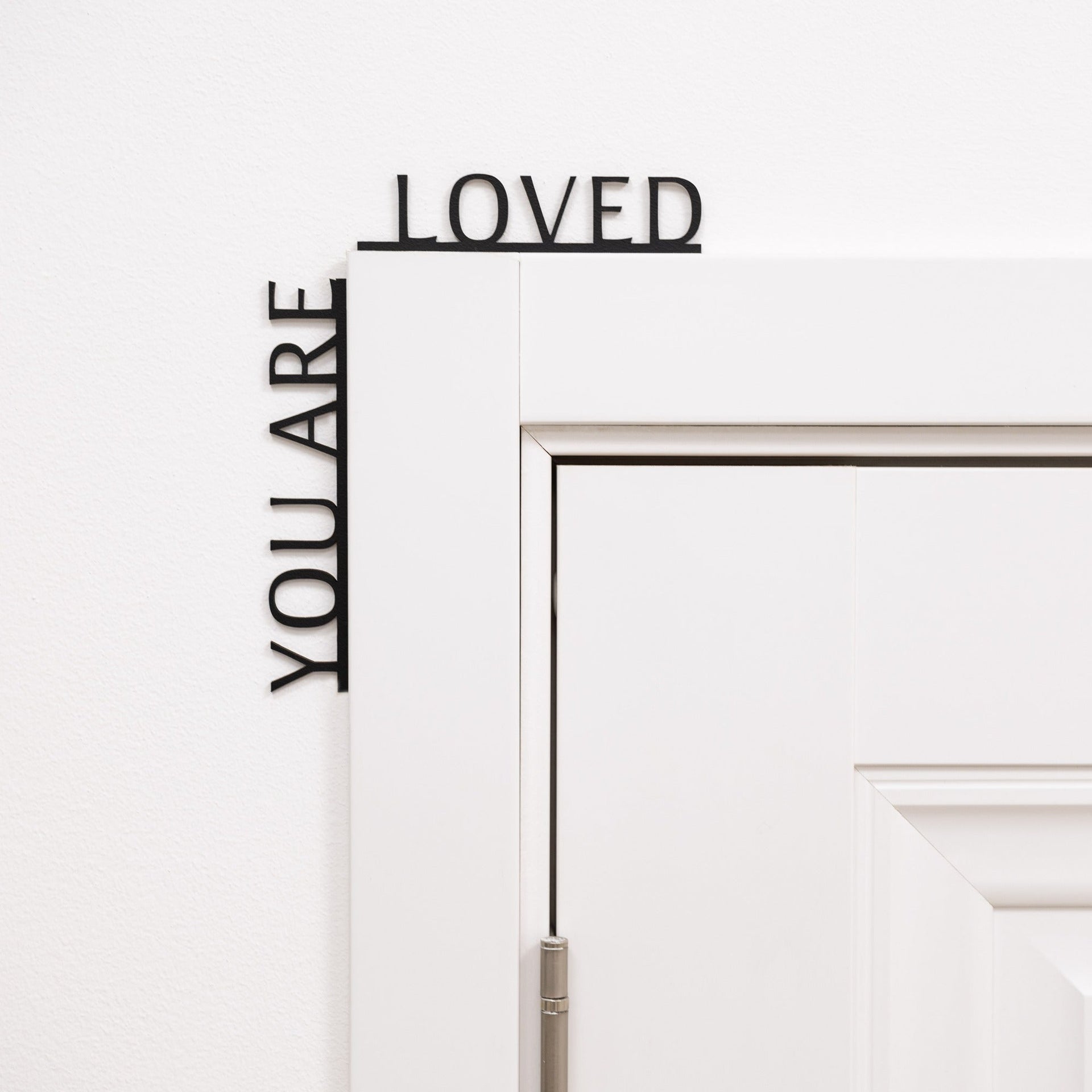Wooden corner wall decor with the text You Are Loved, perfect for a nursery or kids room.