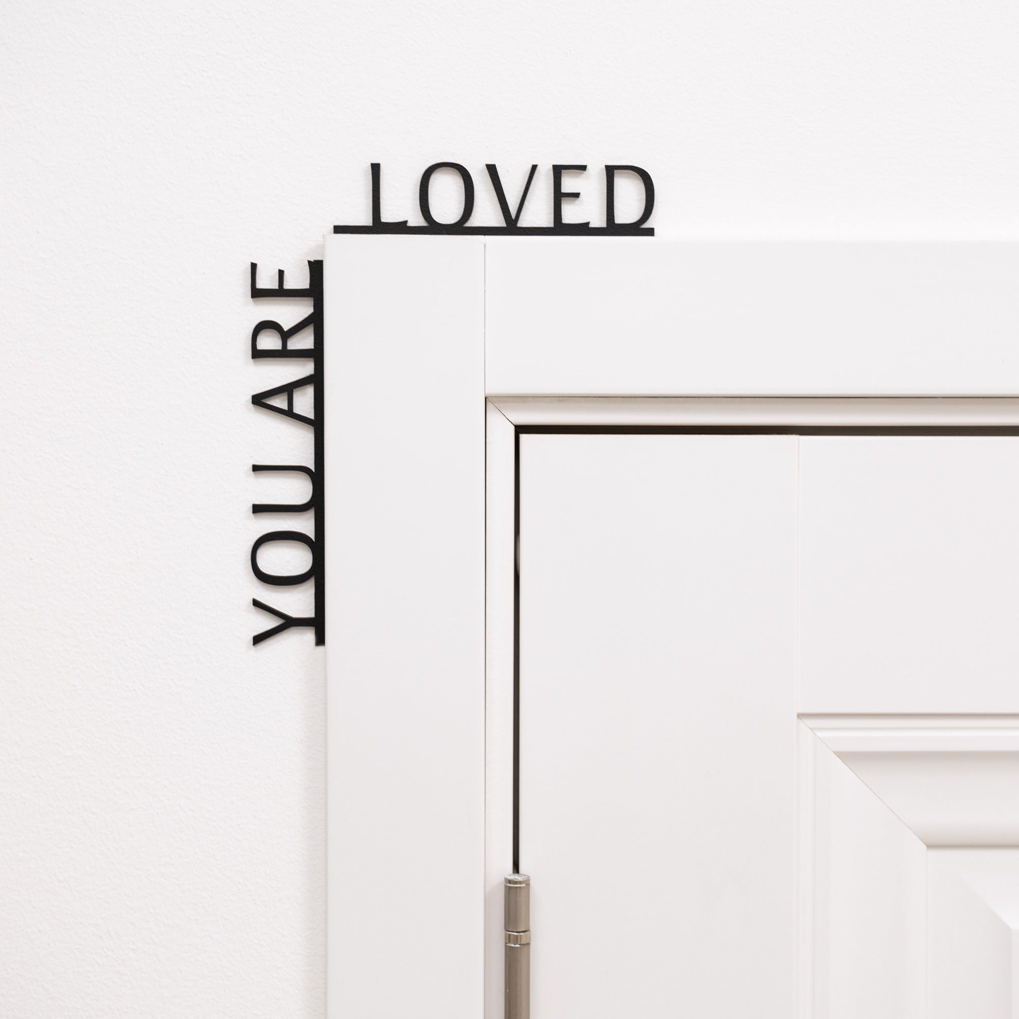 Wooden corner wall decor with the text You Are Loved, perfect for a nursery or kids room.