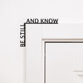 Wooden Be Still and Know wall inscription mounted in a room corner for home mindfulness decor