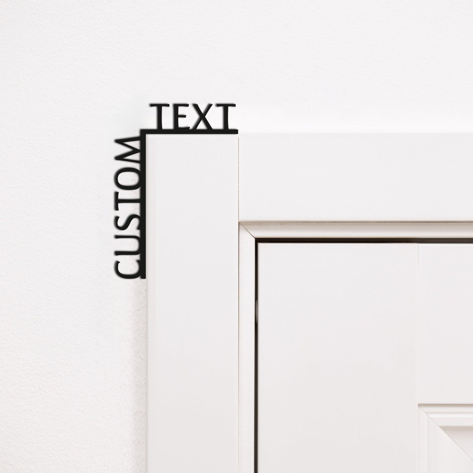 Customizable black wooden wall art quote installed on a room corner.