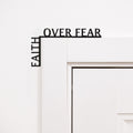 Minimalist black wooden corner quote reading 'Faith Over Fear' for inspirational wall decor.